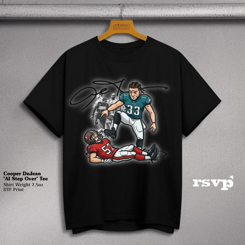DeJean’s “AI Step Over” Tee